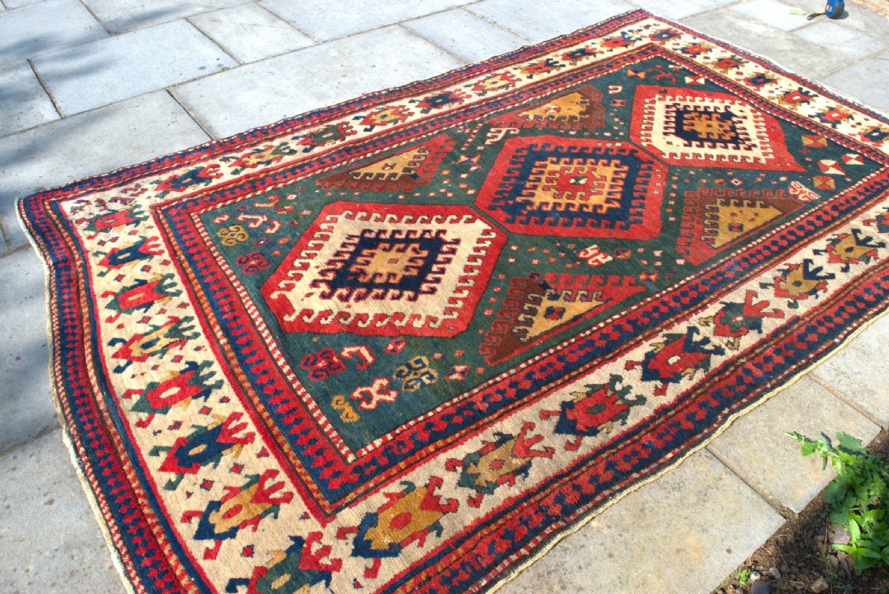 Antique Kazak rug 240x150 cm View II
