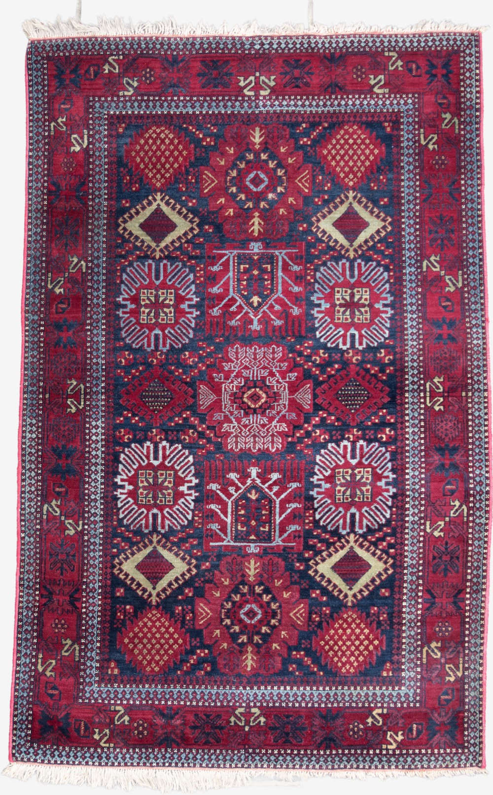 An antique Agra rug 193x122cm