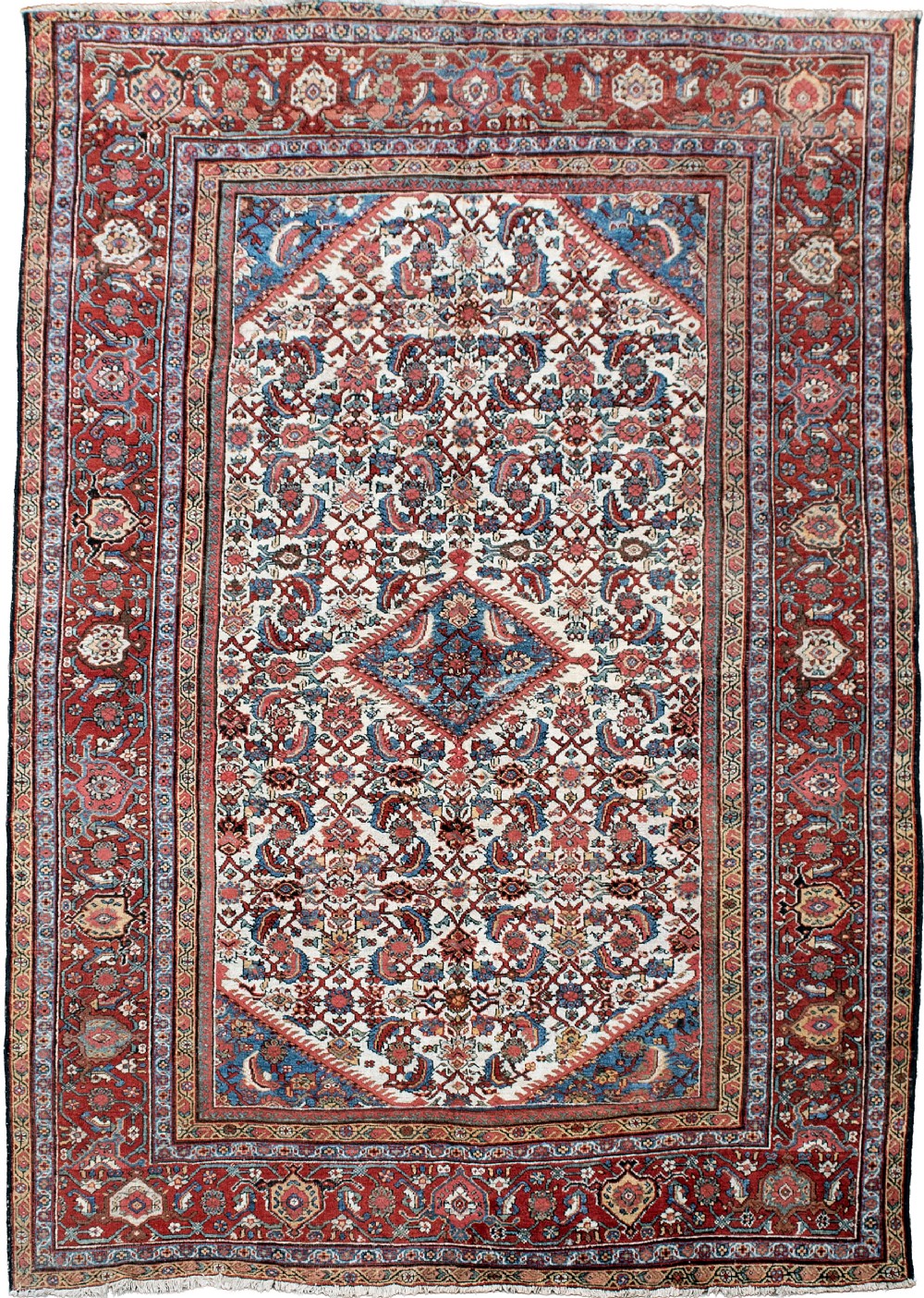 A large hand-knotted Persian Ferahan carpet featuring a central diamond medallion, Herati-patterned cream field, and detailed terracotta and blue borders.