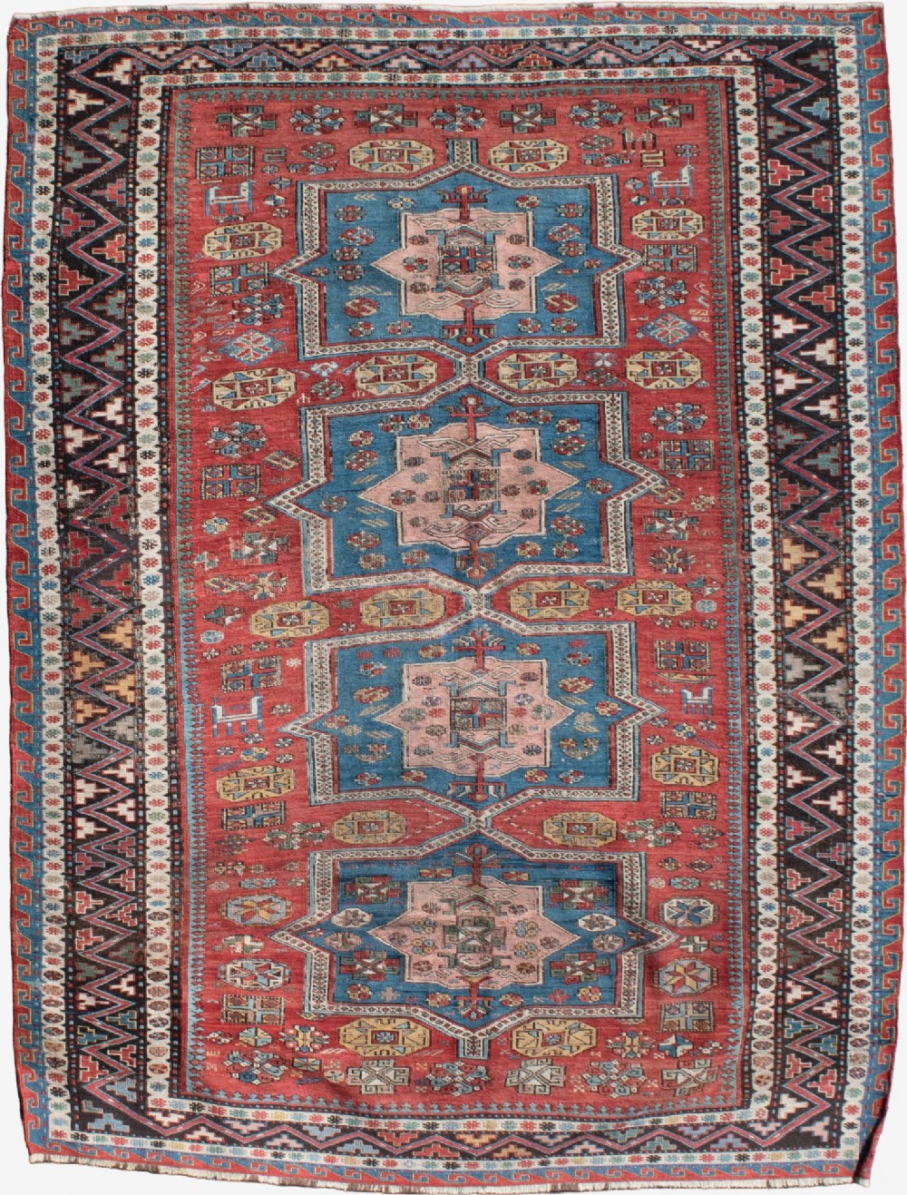 An Antique Kuba Sumak rug 189x143cm
