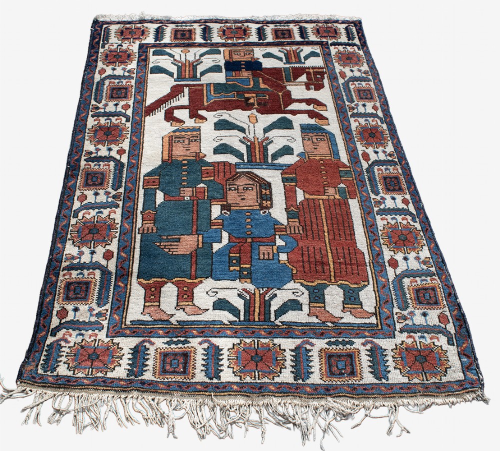 An antique Baluch pictorial wool rug featuring figurative human characters and a rider on horseback on a cream central field with geometric borders. View IV
