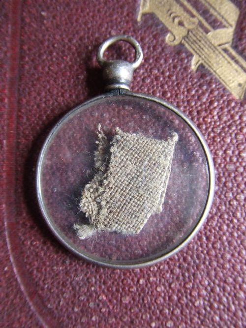 A French 19th Century Amulet / Reliquary Containing Fabric