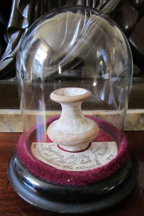 An Ancient Pot from Alexandria Under Antique Glass Dome