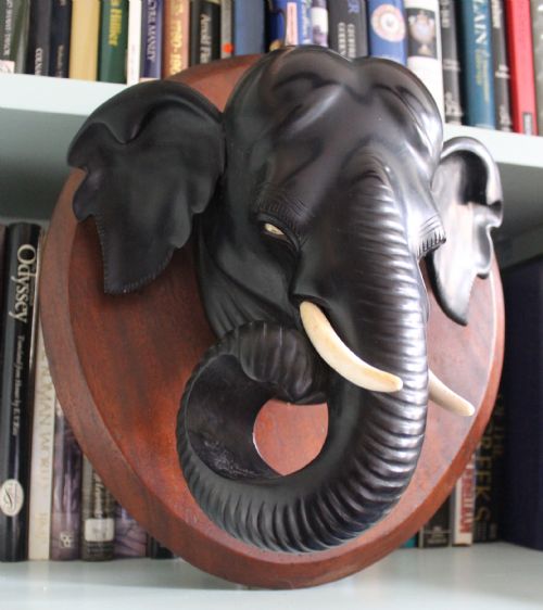 An Unusually Large Anglo-indian Carved Ebony Elephant's Head Wall Plaque