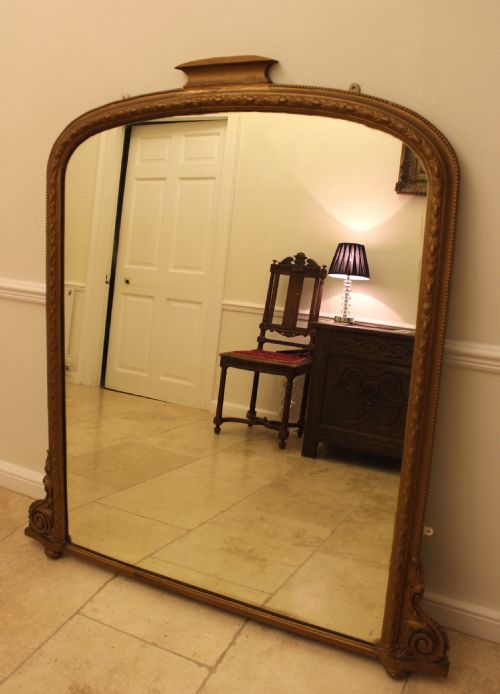 A Large Victorian Gilt Overmantel Mirror