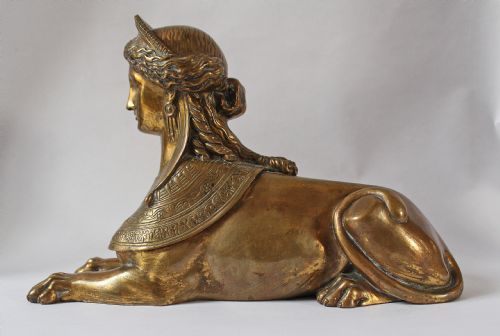 An Antique Bronze Sphinx