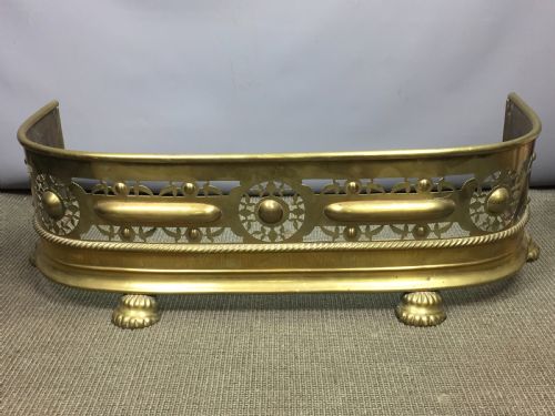 Small Pierced Brass Fireside Fender with Lions Paw Feet
