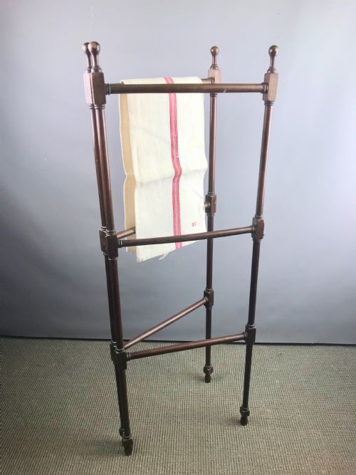An Antique Mahogany Folding Towel Rail in Gillow's Style