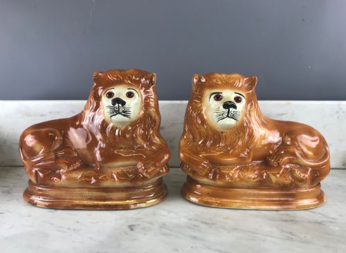 Pair of Scottish Bo'ness Pottery Recumbent Lions of Staffordshire Type