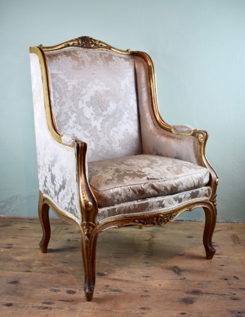 Antique French Carved Giltwood Wingback Chair in Louis Xv Style