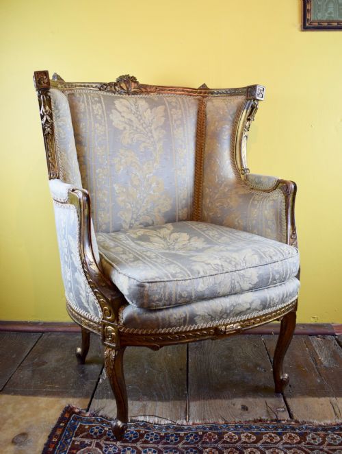 Antique French Gilt Wood Wingback Armchair in Louis Xvi Style