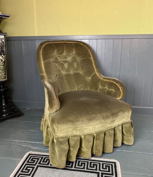 fig 1. Victorian iron framed button back armchair