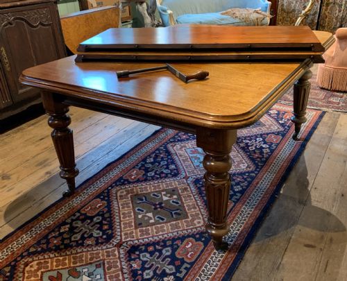 fig 2. Victorian mahogany extending dining table with 2 additional leaves