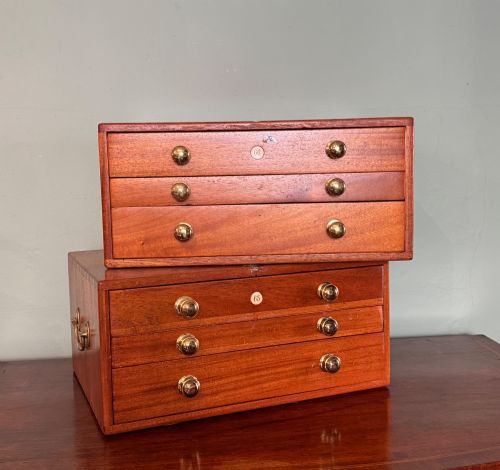 PAIR OF MAHOGANY DENTISTS OR LABORATORY CHESTS OF DRAWERS
