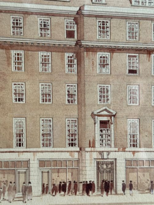 fig 1. A framed 1920s sepia architectural watercolour rendering depicting the facade of Three Kings House in London, presented within a wide cream mount and dark wooden frame.