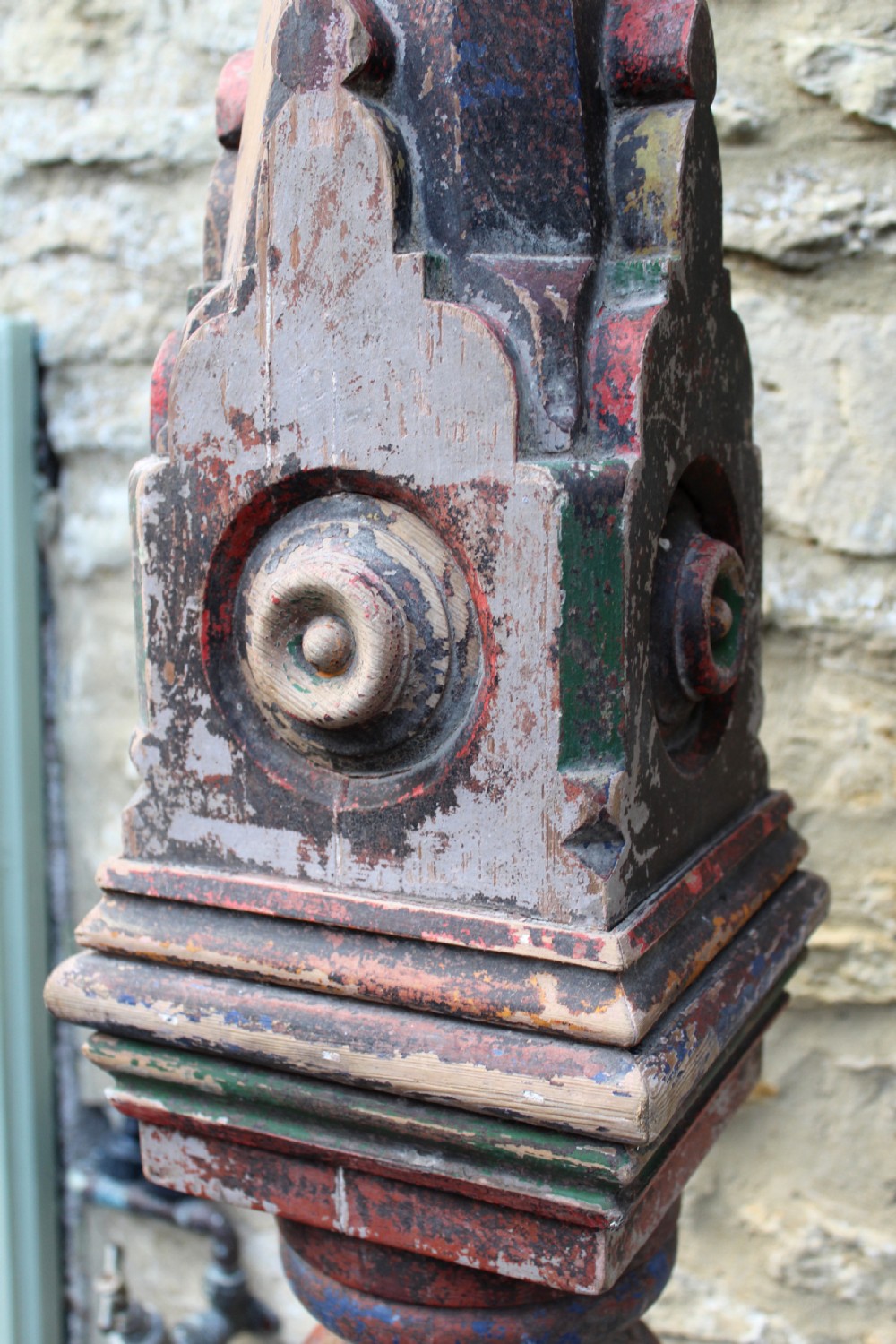 A Victorian Gothic Pitch Pine Architectural Newel Post, with original paint