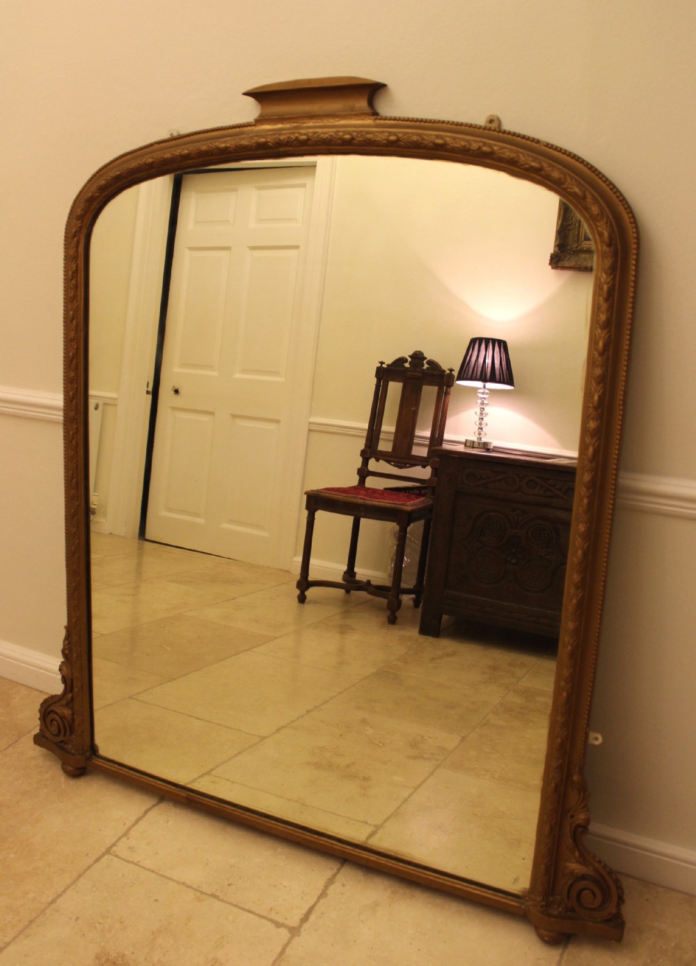 A Large Victorian Gilt Overmantel Mirror