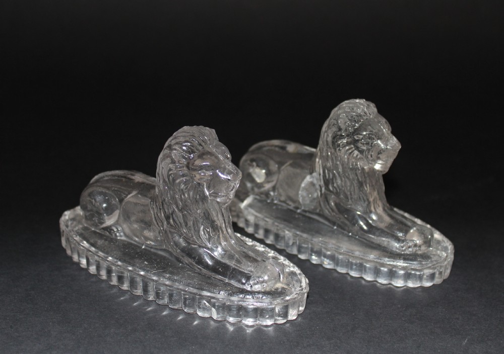 Pair of John Derbyshire Pressed Glass Lions after Landseer