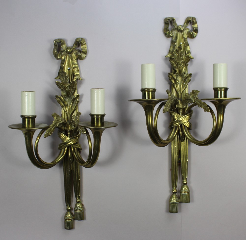 Pair of Louis XVI Gilt Brass Wall Lights cast with ribbon tied tassels