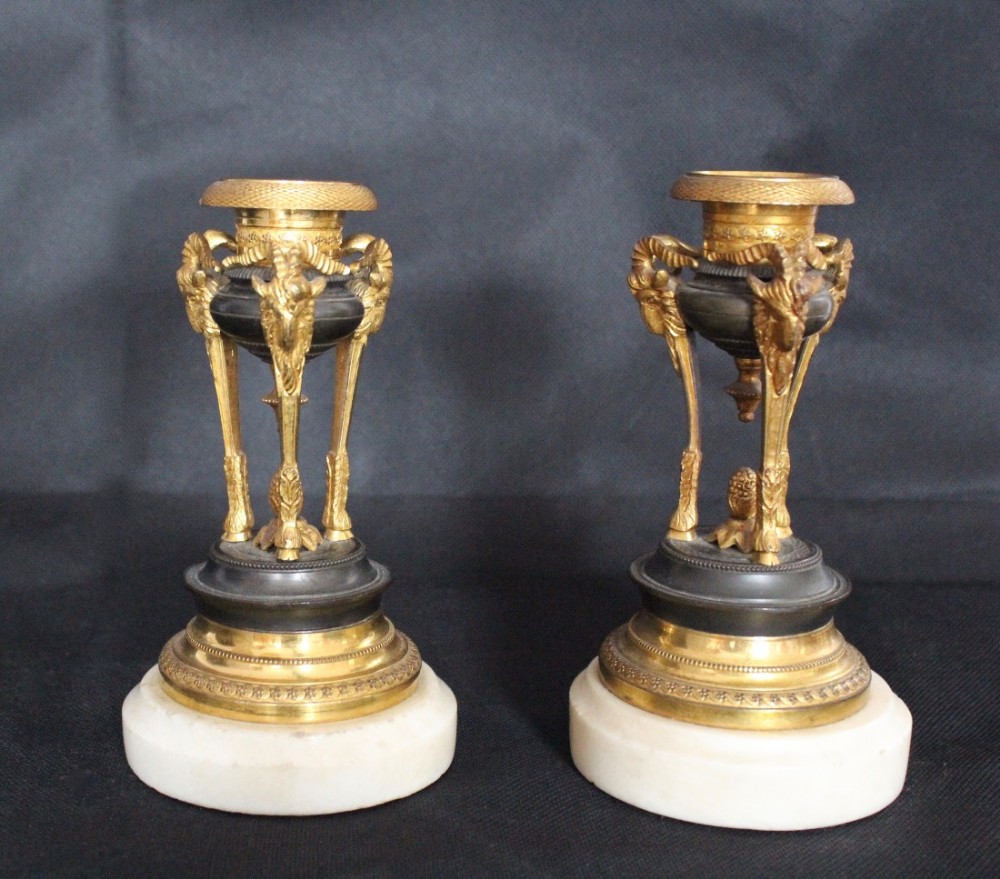 A pair of French Empire Gilt Bronze Candlesticks