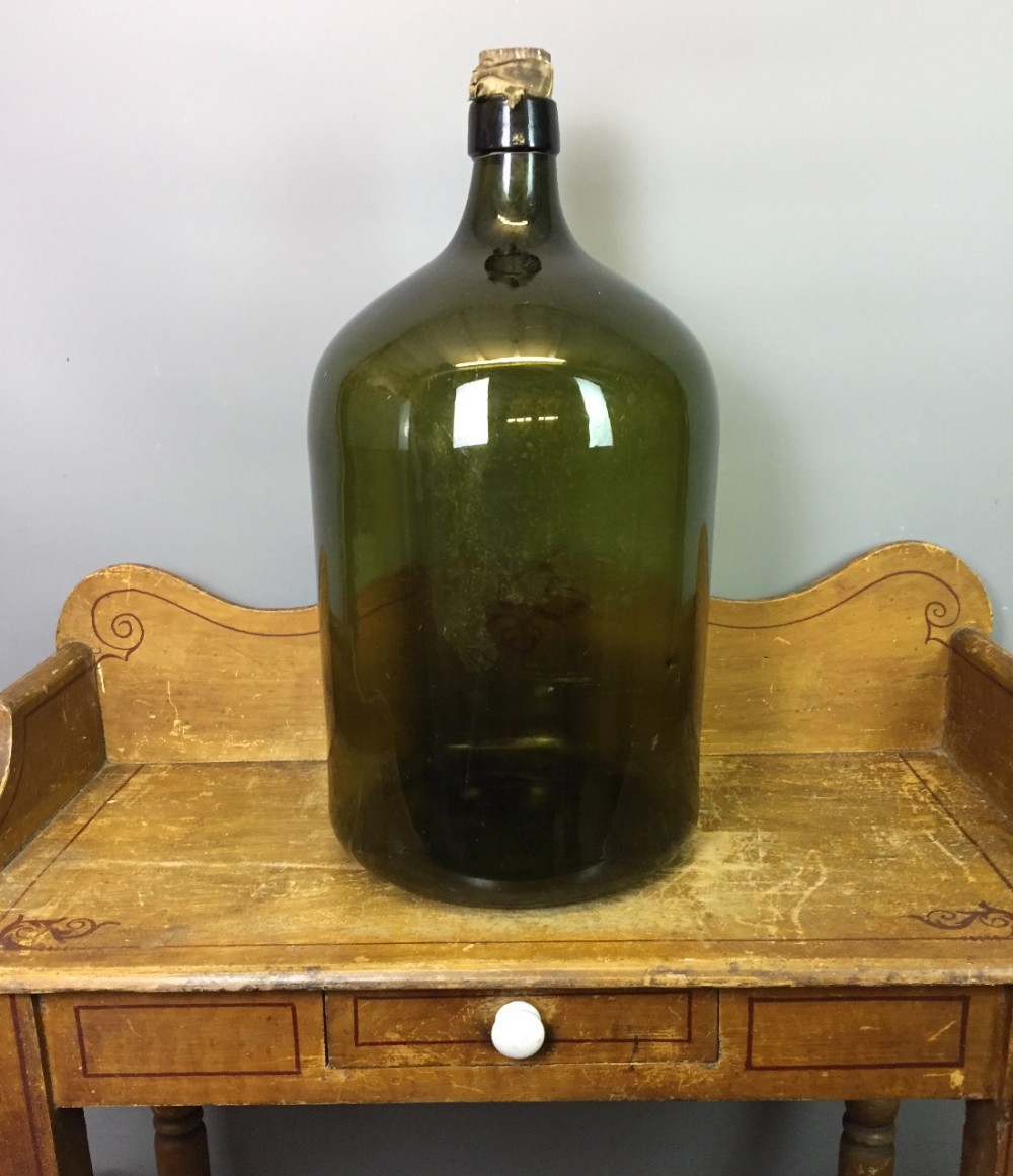Large Antique hand blown green glass carboy