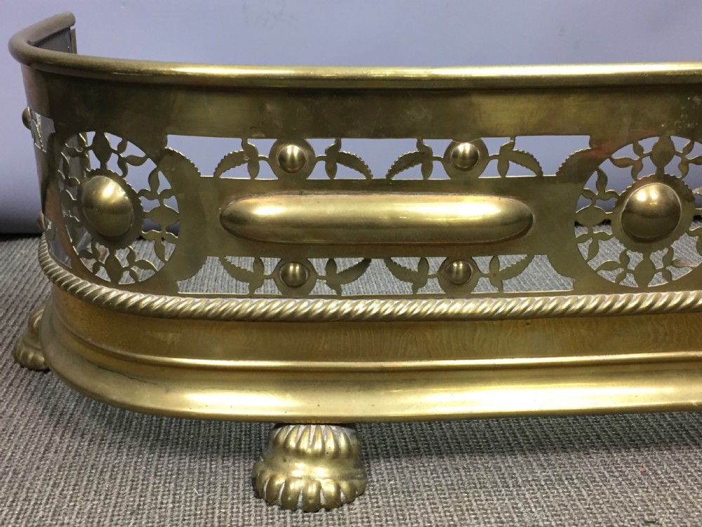 Small Pierced Brass Fireside Fender with lions paw feet View IV