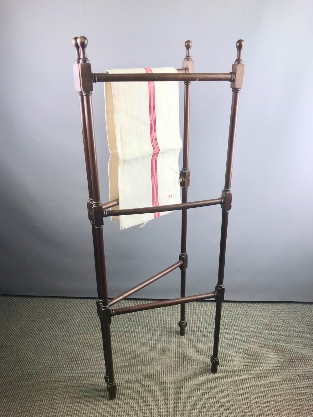 An Antique Mahogany Folding Towel Rail in Gillow's Style