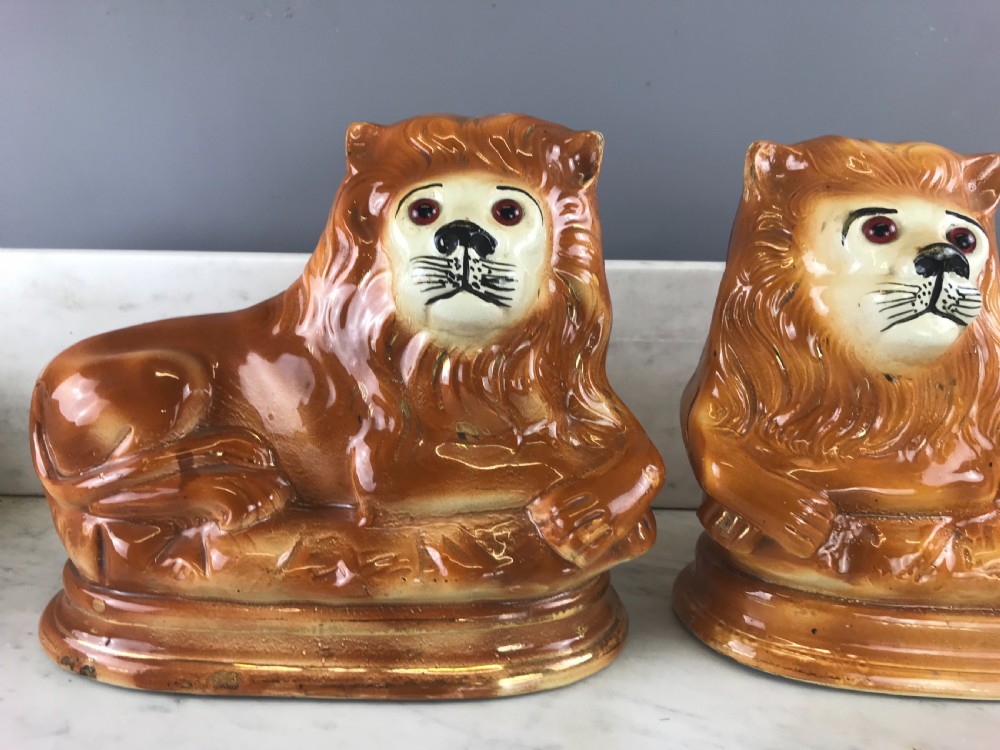 Pair of Scottish Bo'ness Pottery recumbent lions of Staffordshire type View II