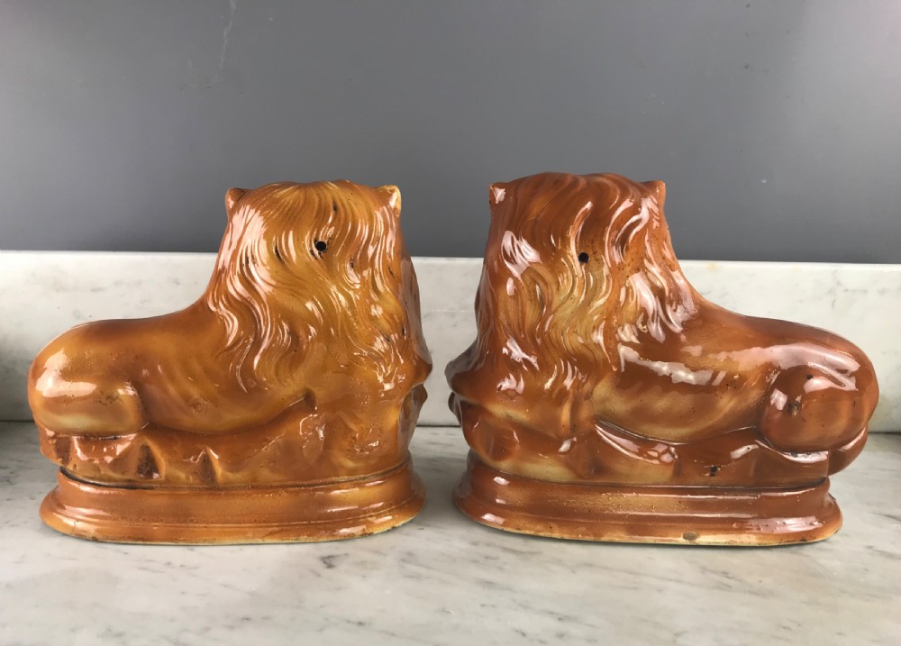 Pair of Scottish Bo'ness Pottery recumbent lions of Staffordshire type View III