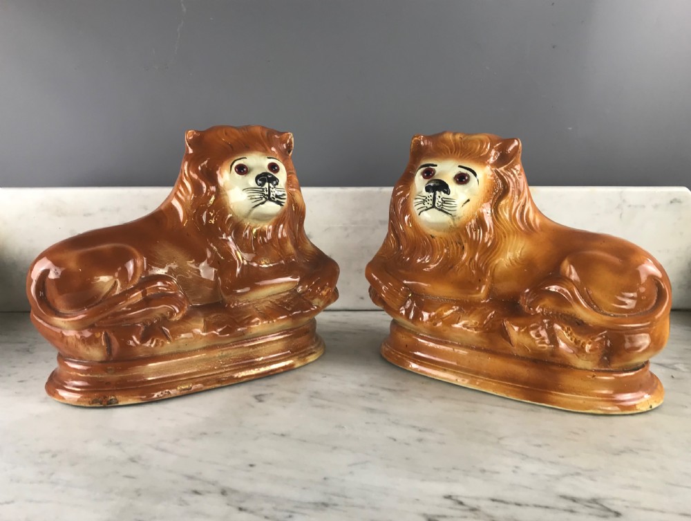 Pair of Scottish Bo'ness Pottery recumbent lions of Staffordshire type View IV
