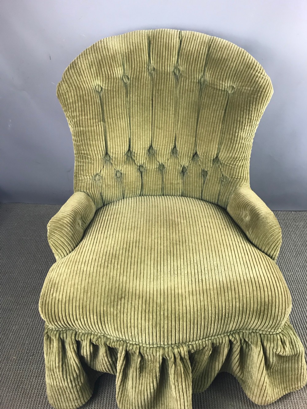 Small Victorian button back armchair upholstered in green corduroy View IV