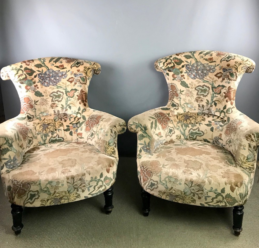 Pair of French Napoleon III upholstered armchairs