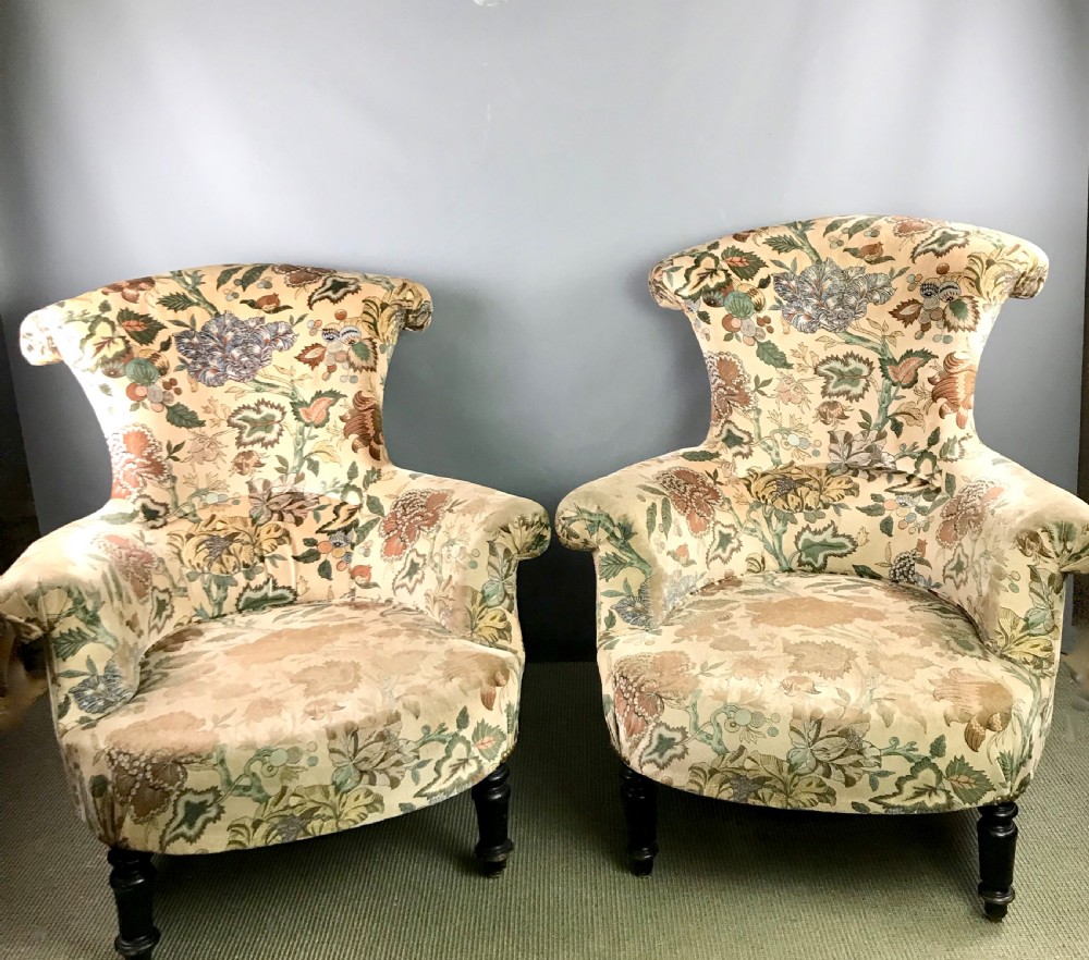 Pair of French Napoleon III upholstered armchairs View II