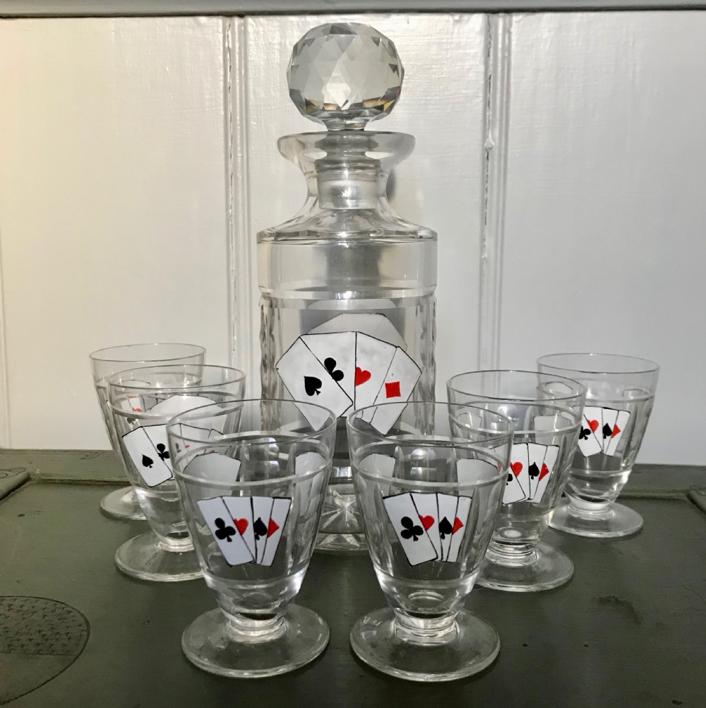 Bohemian Cut Glass Decanter Set enamelled with playing cards in the manner of Karl Palda