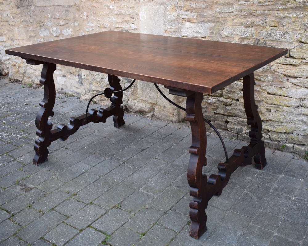 Spanish Trestle Dining Table with Iron Stretcher View IV