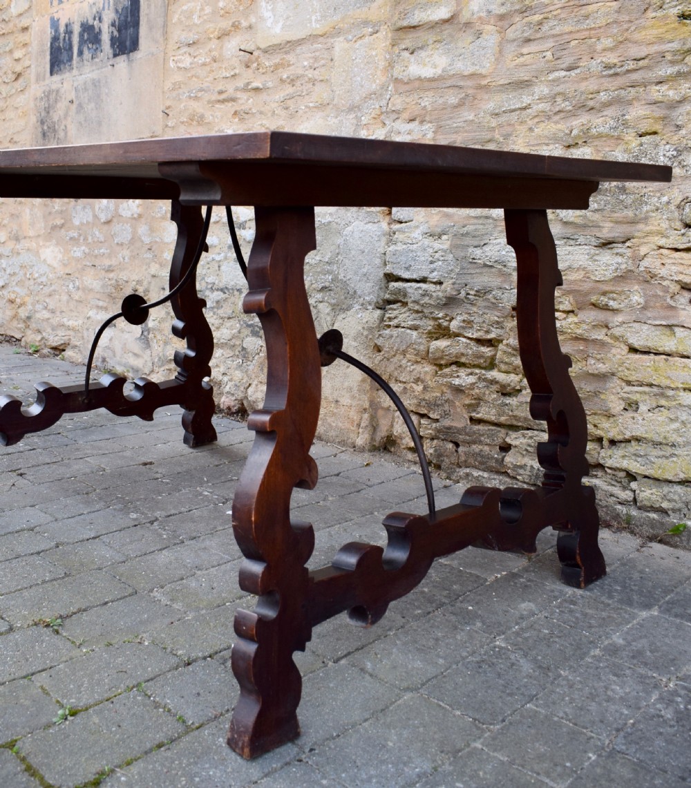 Spanish Trestle Dining Table with Iron Stretcher View V