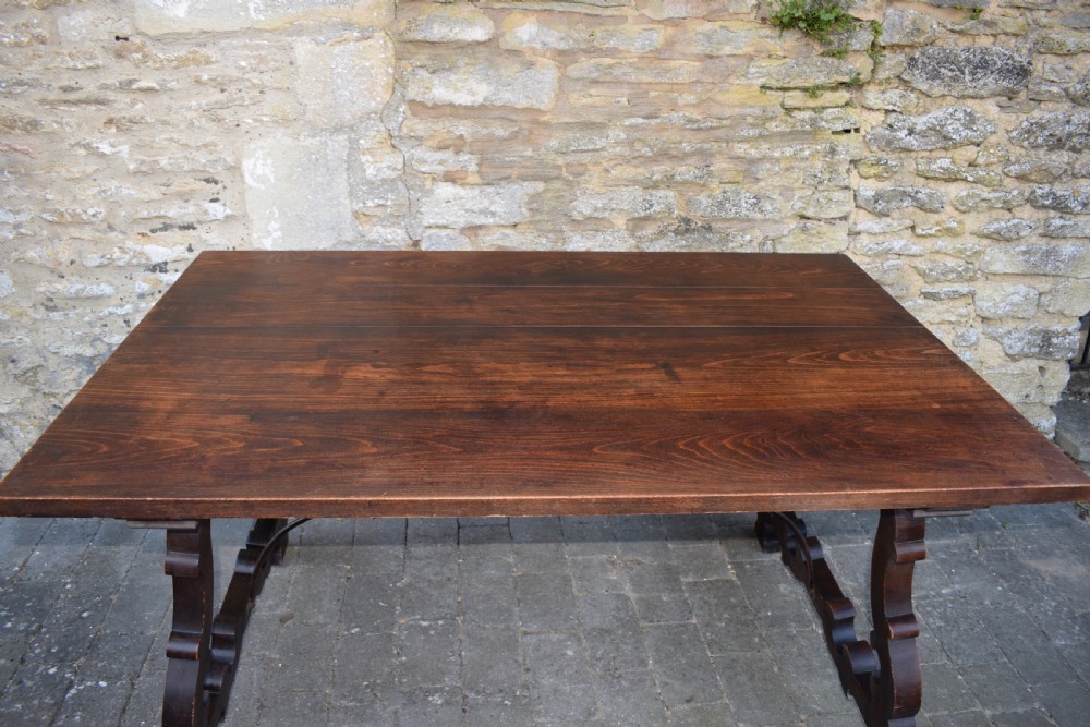Spanish Trestle Dining Table with Iron Stretcher View VI