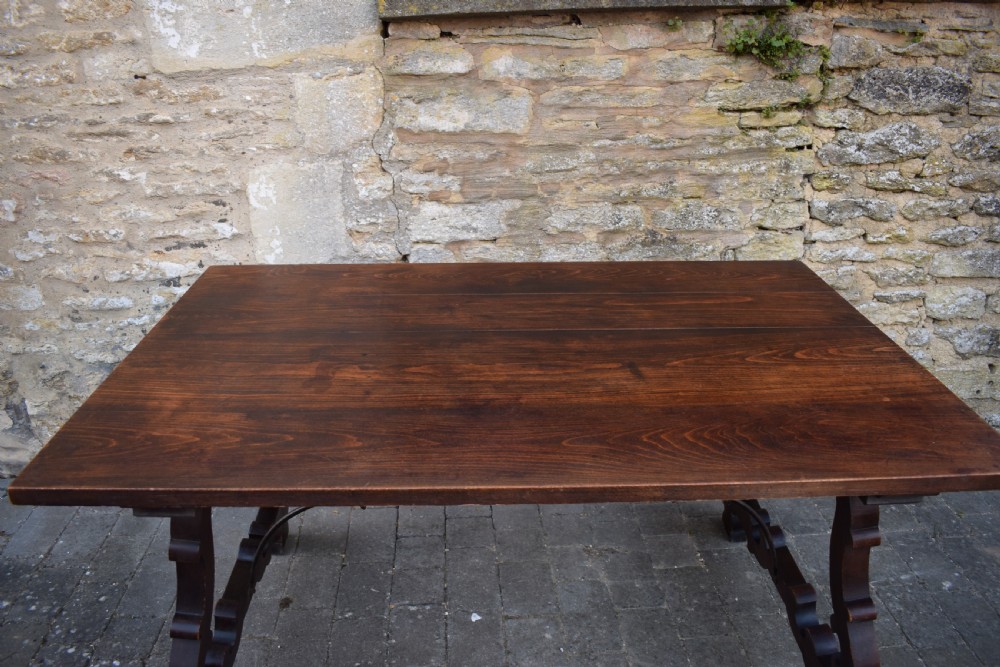 Spanish Trestle Dining Table with Iron Stretcher View VII