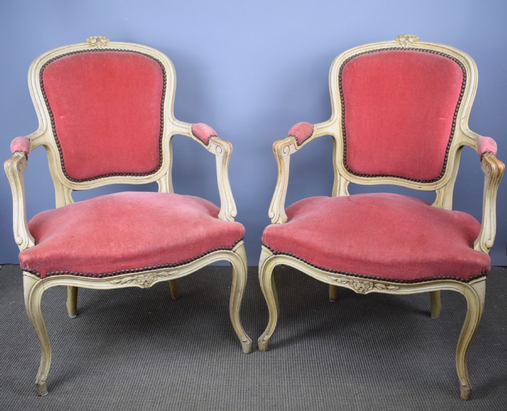 Pair of painted French Fauteuil Armchairs in Louis XV style with rose pink velvet upholstery