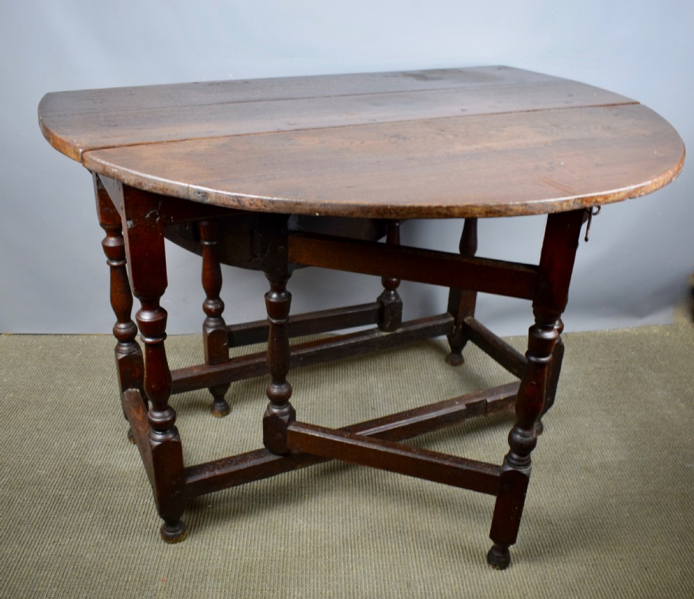 George I Oak gateleg drop flap dining table circa 1700 View V