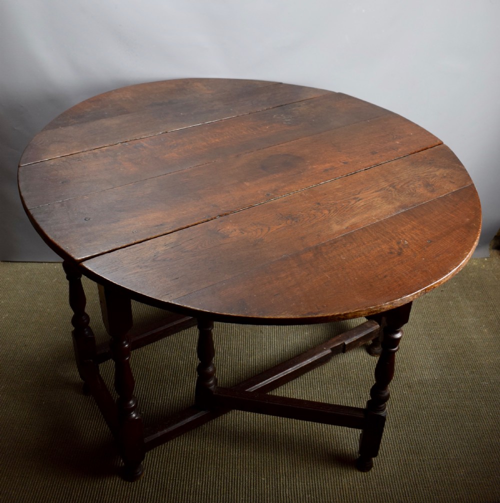 George I Oak gateleg drop flap dining table circa 1700 View X