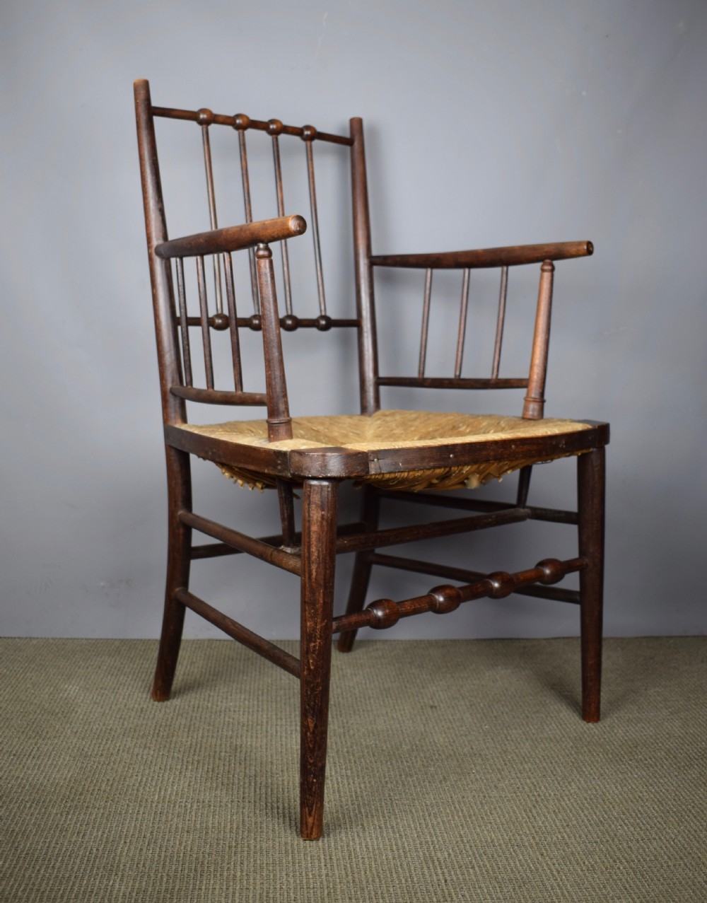 Arts & Crafts Sussex chair with bobbin turner back and rush seat