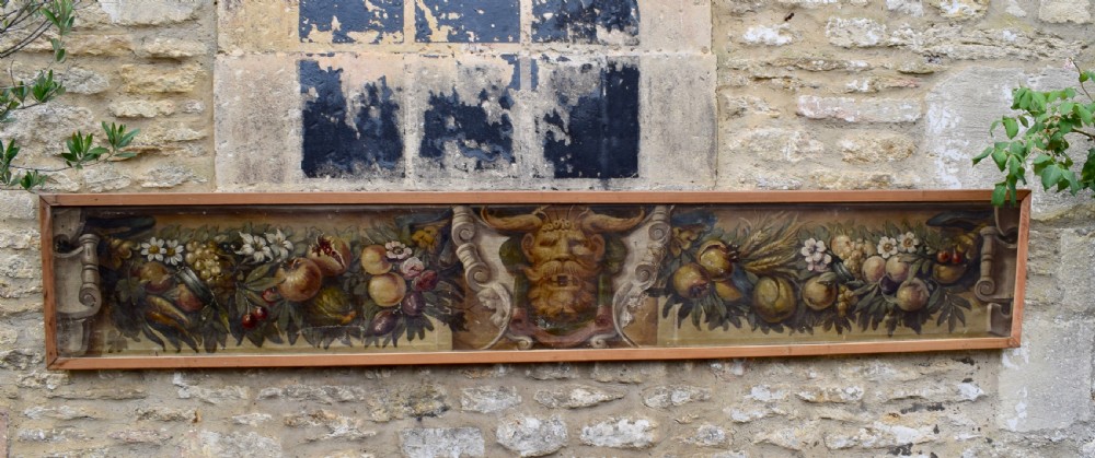 Large Italian Trompe L'oeil architectural oil painting of a mask and swags of fruit