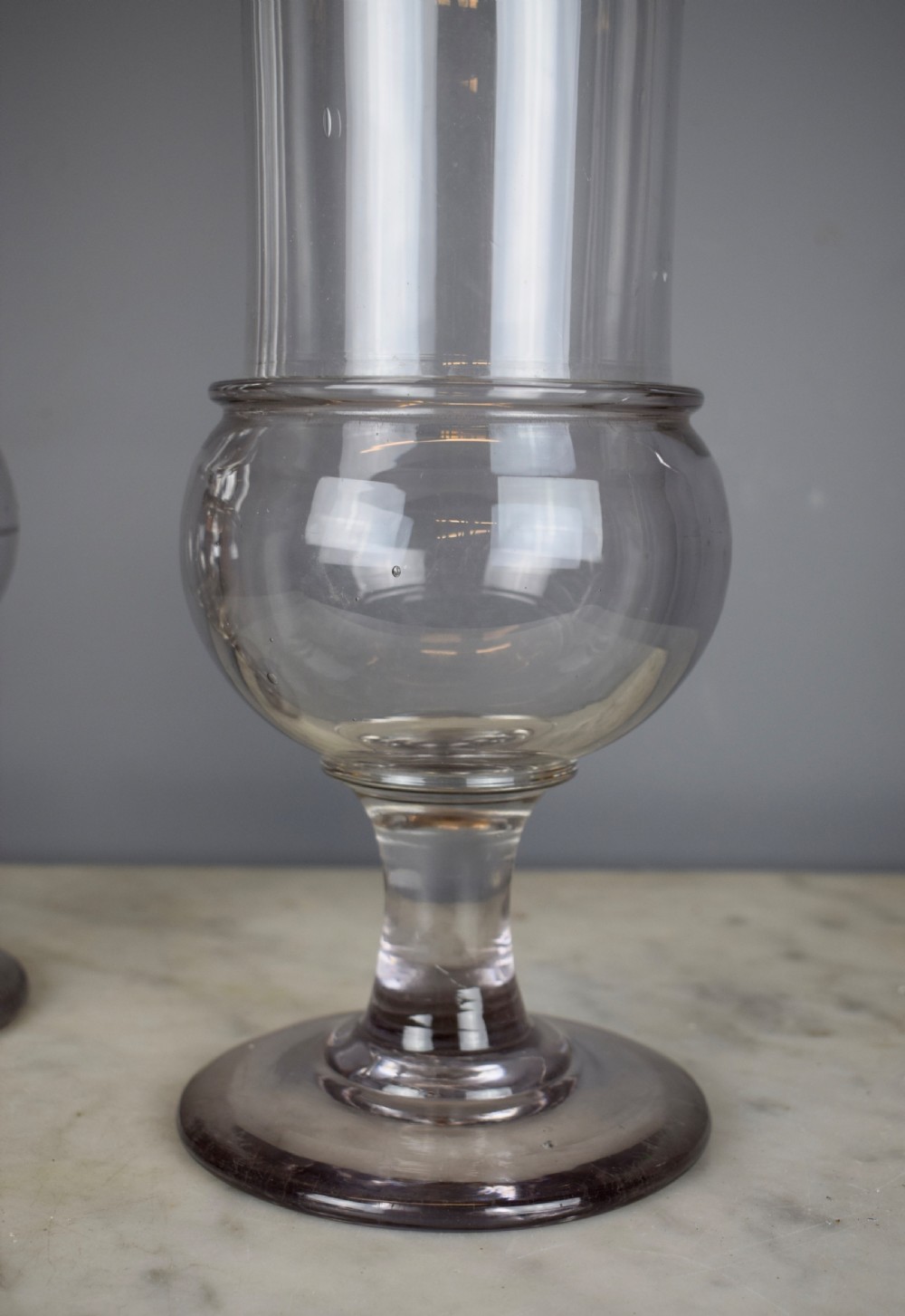 Pair of French hand blown glass apothecary chemist jars View II