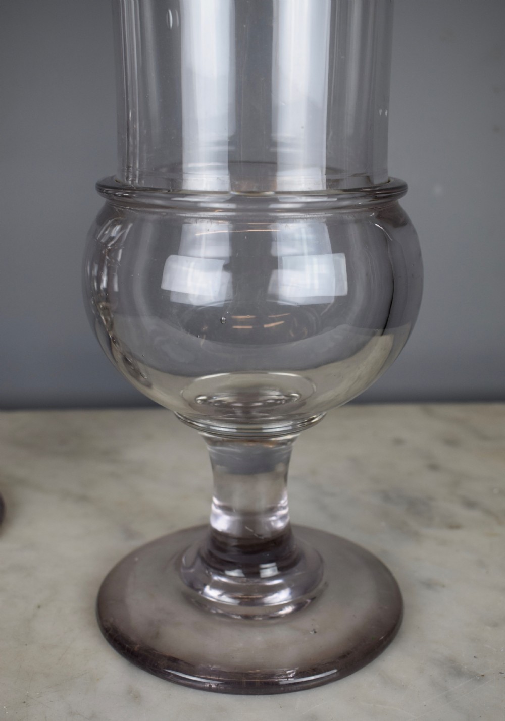 Pair of French hand blown glass apothecary chemist jars View III