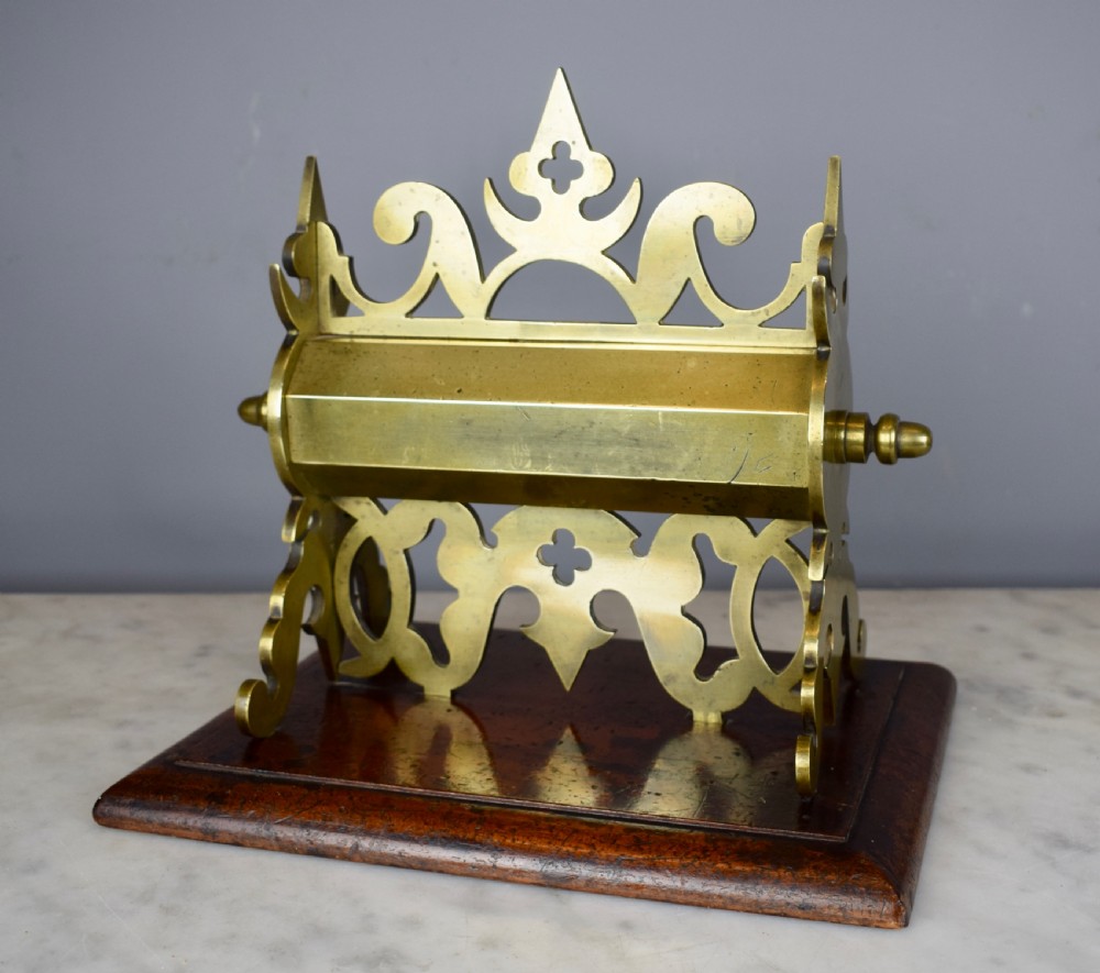 Victorian Gothic brass money box upon mahogany plinth base 