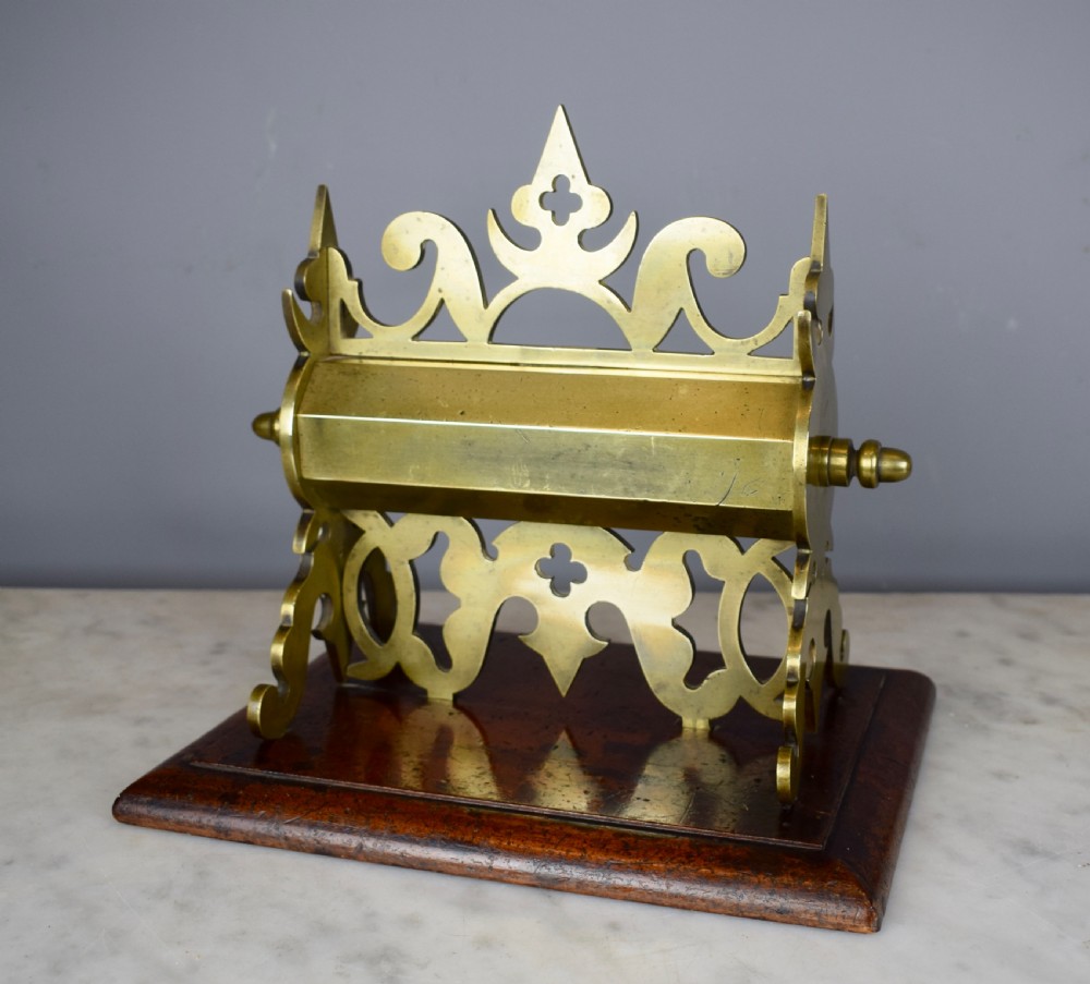 Victorian Gothic brass money box upon mahogany plinth base  View II