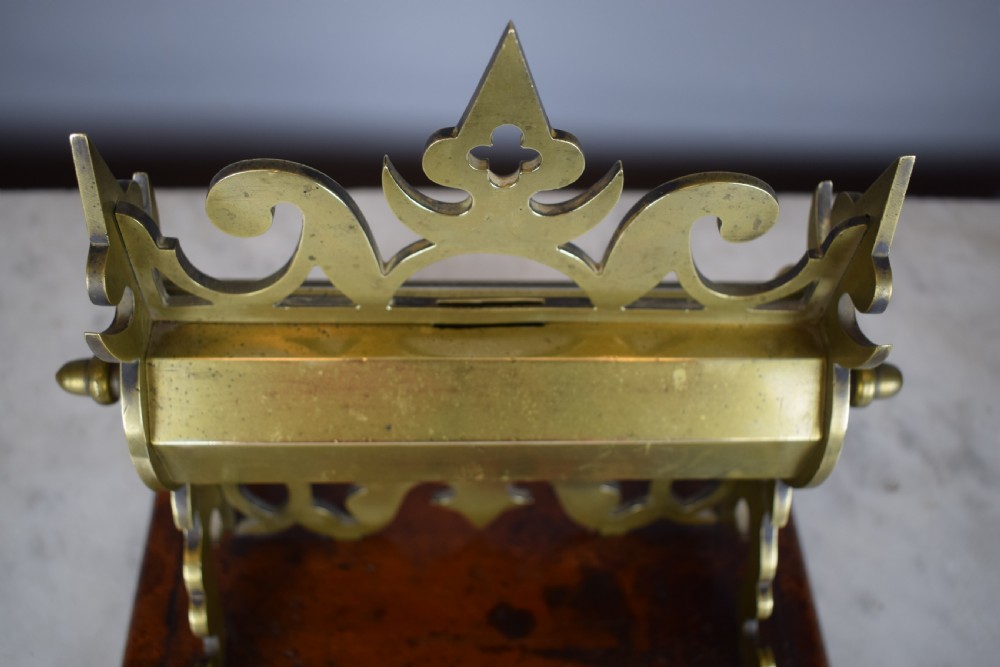 Victorian Gothic brass money box upon mahogany plinth base  View IV