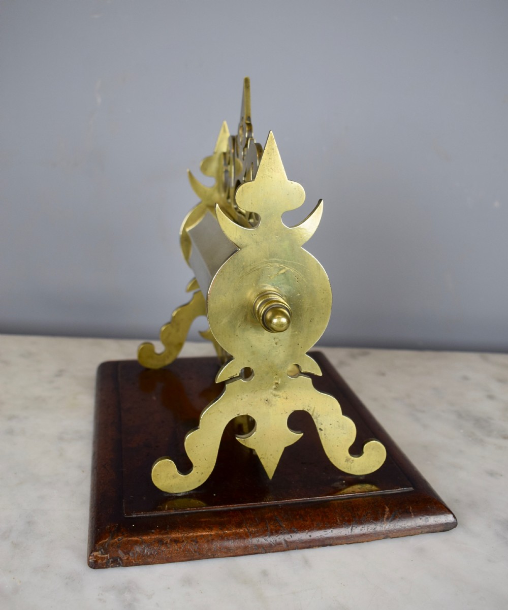 Victorian Gothic brass money box upon mahogany plinth base  View V