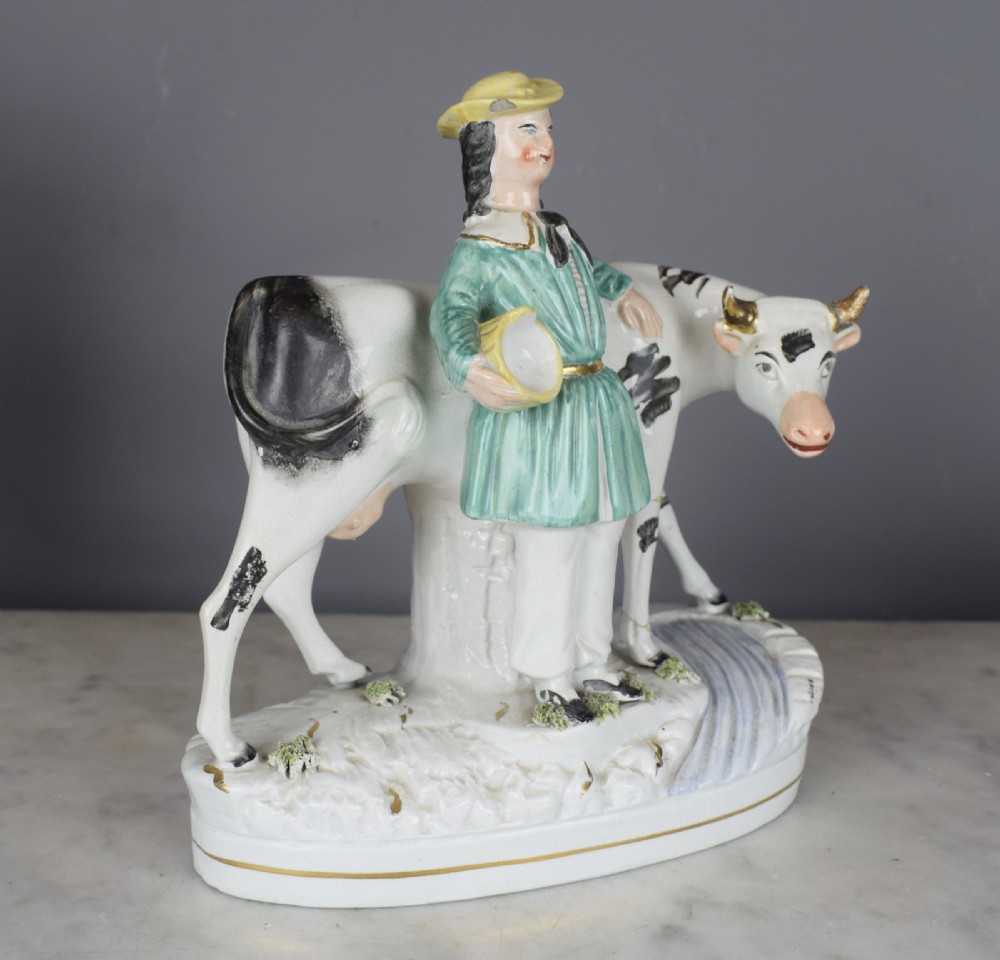 Victorian Staffordshire pottery cow figure group